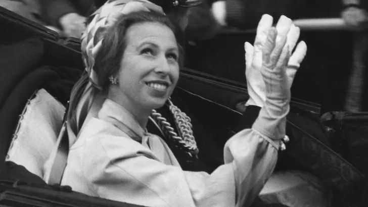 Princess Anne waves on the way back to Buckingham palace from the Guildhall, 7th June 1977. A service was held in St Paul's Cathedral followed by a luncheon at the Guildhall to celebrate the Queen's Silver Jubilee.