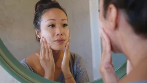 Indonesian Woman Washing Her Face Using Beauty Cleanser Soap