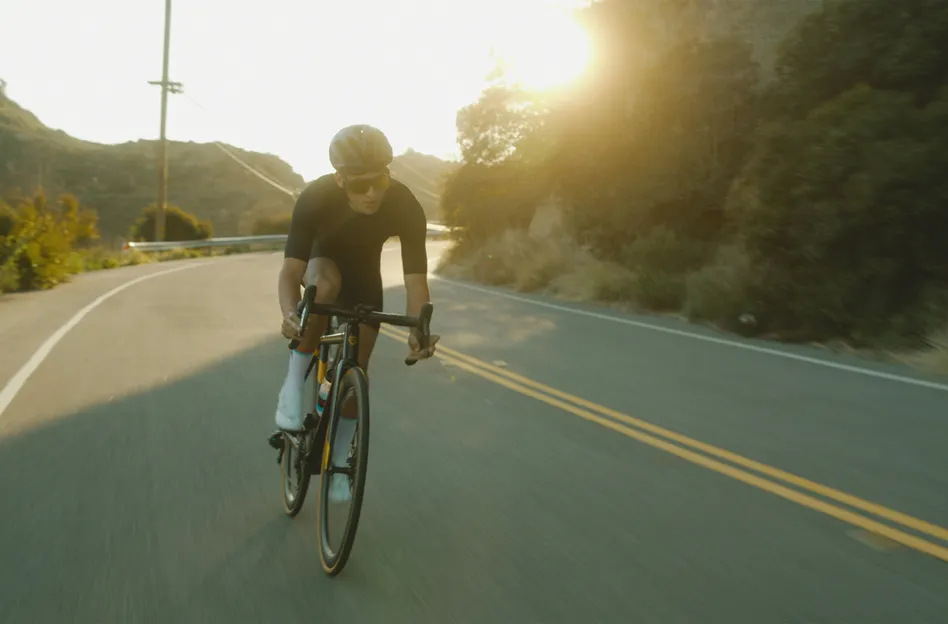 zonsopkomst racefietser