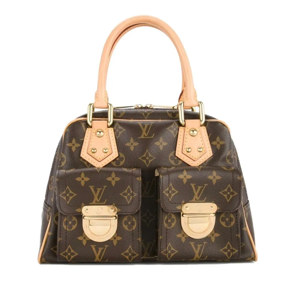 Estelles eerste designertas van Louis Vuitton.