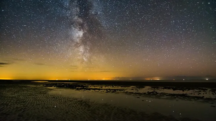 Milchstraße am Wattenmeer in St Peter Ording Bad, Nordsee in Deutschland