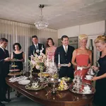 Group of adults enjoying dinner party