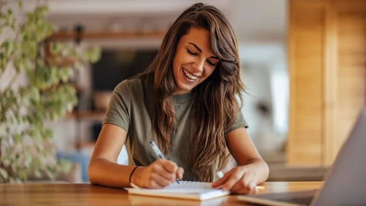 Adult woman, enjoying the work she currently does.