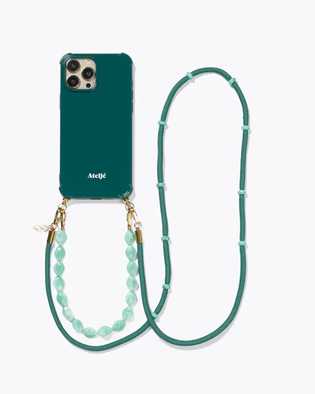 Telefoonhoesje met matchende telefoonkoorden in teal van Ateljé.