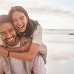 Shot of a couple enjoying a day at the beach