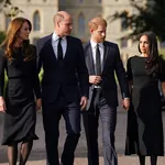 The Prince and Princess of Wales and the Duke and Duchess of Sussex viewing the messages and floral tributes