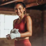 Woman getting ready for boxing practice