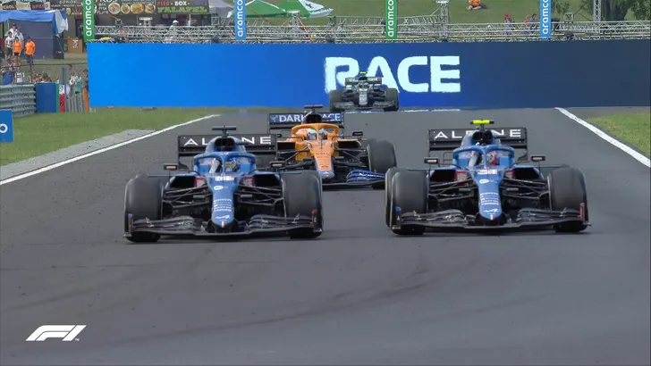 Esteban Ocon wint in de chaos van Hongarije!