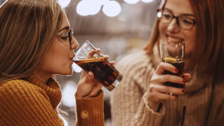 Women drinking coke