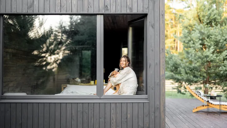 Woman enjoy nature at country house