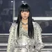 Van catwalk naar kast: slangenprint look van Philipp Plein. – Foto van model op de runway bij Philipp Plein in Milan, februari 2024.