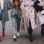 Milan, Italy - February 24, 2018: Extravagant outfit of a influencer outside a fashion show, posing during Milan Fashion Week.