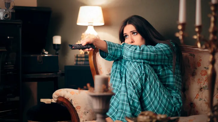 Girl Wearing Pajamas Watching TV in her Room