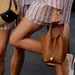 Blote gladde benen in zomeroutfits