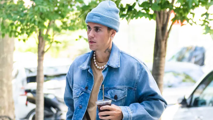 Justin Bieber and Hailey Bieber hold hands as they head to brunch