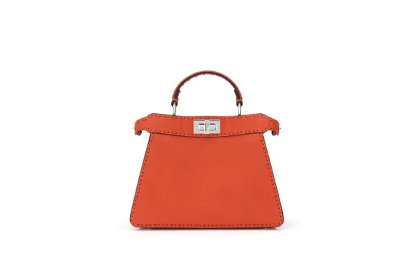 Oranje eyecatcher – dit tasje maakt elke look zonnig en vrolijk.