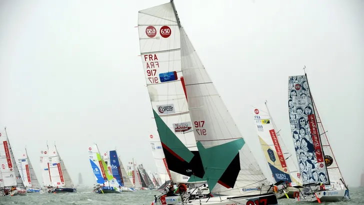 2017-10-01 00:00:00 Competitors sail their monohull as they take the start of the Mini Transat sail…