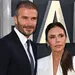 Victoria en David Beckham in zwart wit gekleed