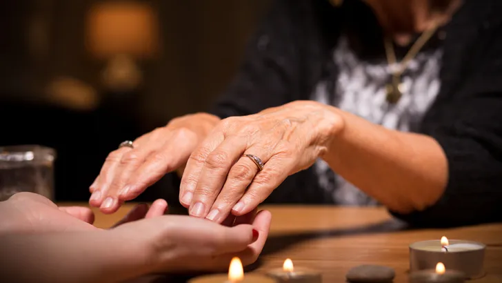 Close-up of spiritualistic seance