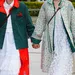 Twee vrouwen in stijlvolle jurken tijdens Fashion Week lente 2025.