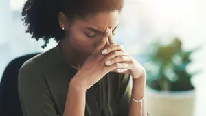 Burnout, stress and business woman in office with problem, mistake and working on deadline. Headache, anxiety and African female worker with frustrated, stressed out and migraine thinking of solution