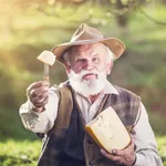 Een boer met een blok kaas