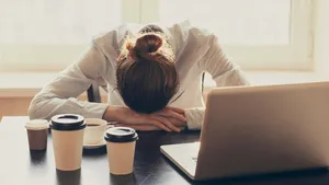 Tired woman in the office