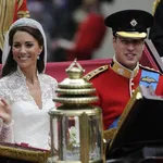 Britain's Prince William and Catherine Duchess of Cambridge travel to Buckingham Palace along Procession Route after their wedding in Westminster Abbey in London