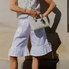 Jorts zijn on trend: zo style je deze broek | Nouveau