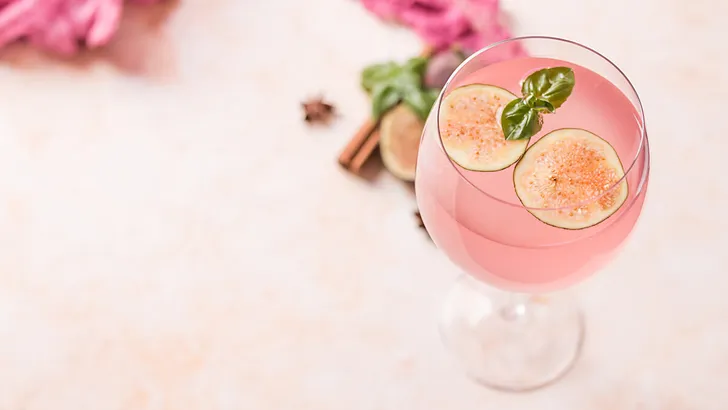 Pink cocktail with fig