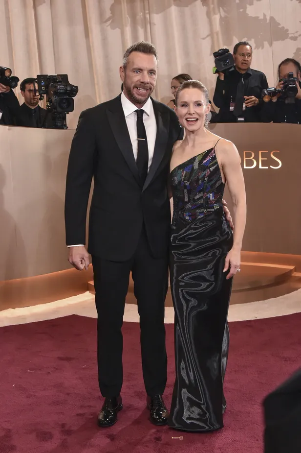 Kristen Bell in Armani met echtgenoot Dax Shepard