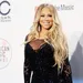 Gênant: Mariah Carey's zoontje gaf over op de jurk van Michelle Obama