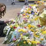 Prince William, Prince of Wales and Catherine, Princess of Wales visit tributes left at Sandringham