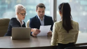 Female candidate interview with HR managers in office