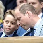 Prince George of Wales with his father, Prince William,