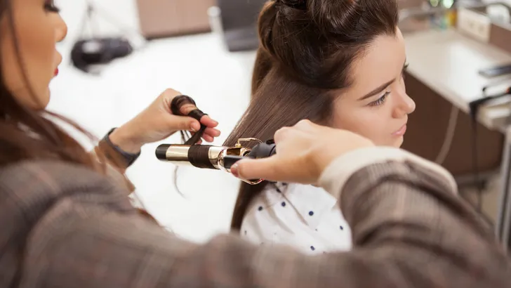 Beautiful woman at hair salon