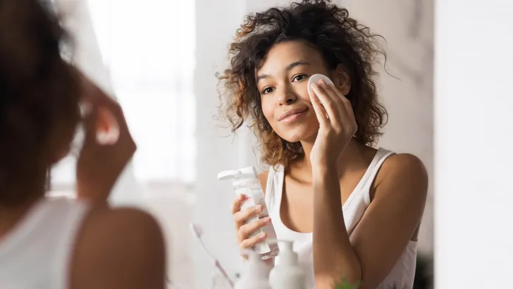 Beautiful afro woman in bathroom