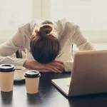 Tired woman in the office