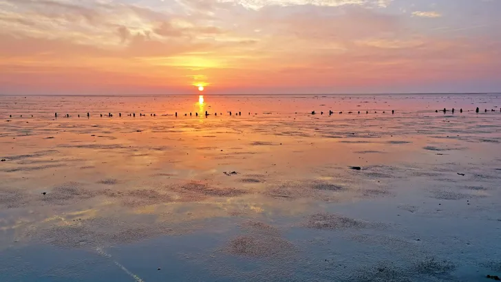 Sunset at the Wadden Sea in the Netherlands