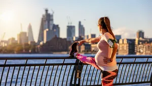 Pregnant woman does her stretching in London