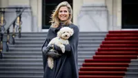 Queen Maxima of The Netherlands with her dog Mambo 