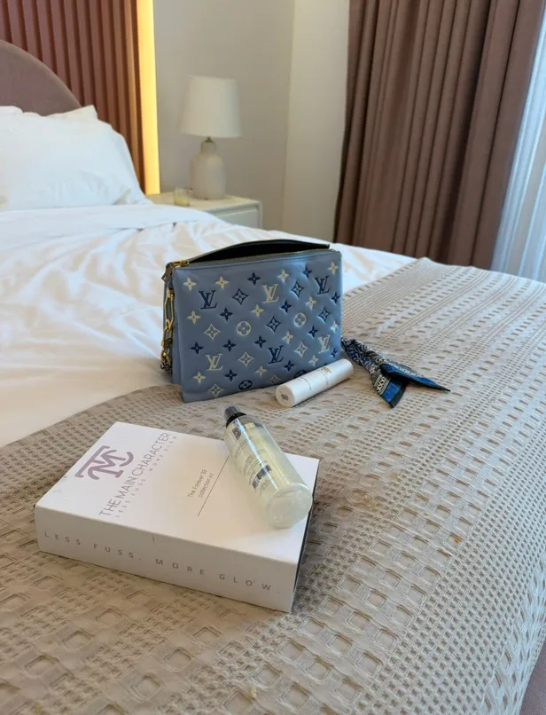 De limited edition Louis Vuitton tricolor light blue coussin. 