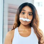 Cropped shot of a young woman posing with a fake mustache made from shaving cream