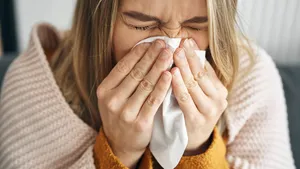 Woman having a very heavy flu