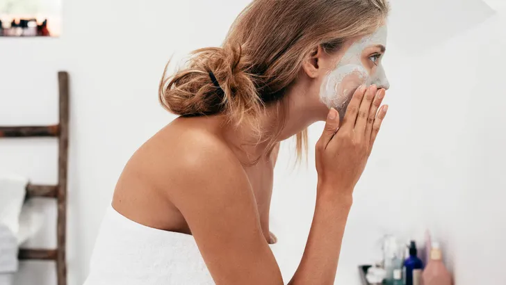 Woman taking care of her facial skin