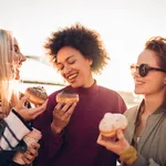 Friends eating donuts