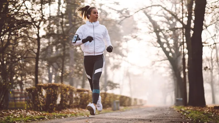 Woman jogging during winter morning