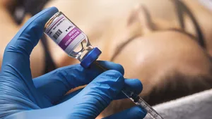 cosmetic injection. filling syringe with botulinum toxin