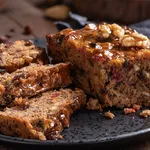 Fruitcake Loaf Sliced on a Plate