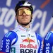Remco Evenepoel in het Red Bull-tenue op een startpodium
